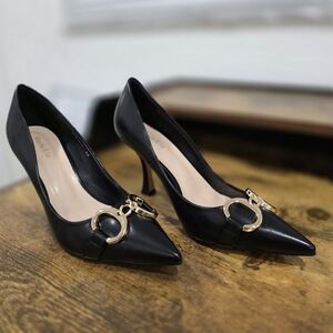 Elegant Black Heels with Gold Accents